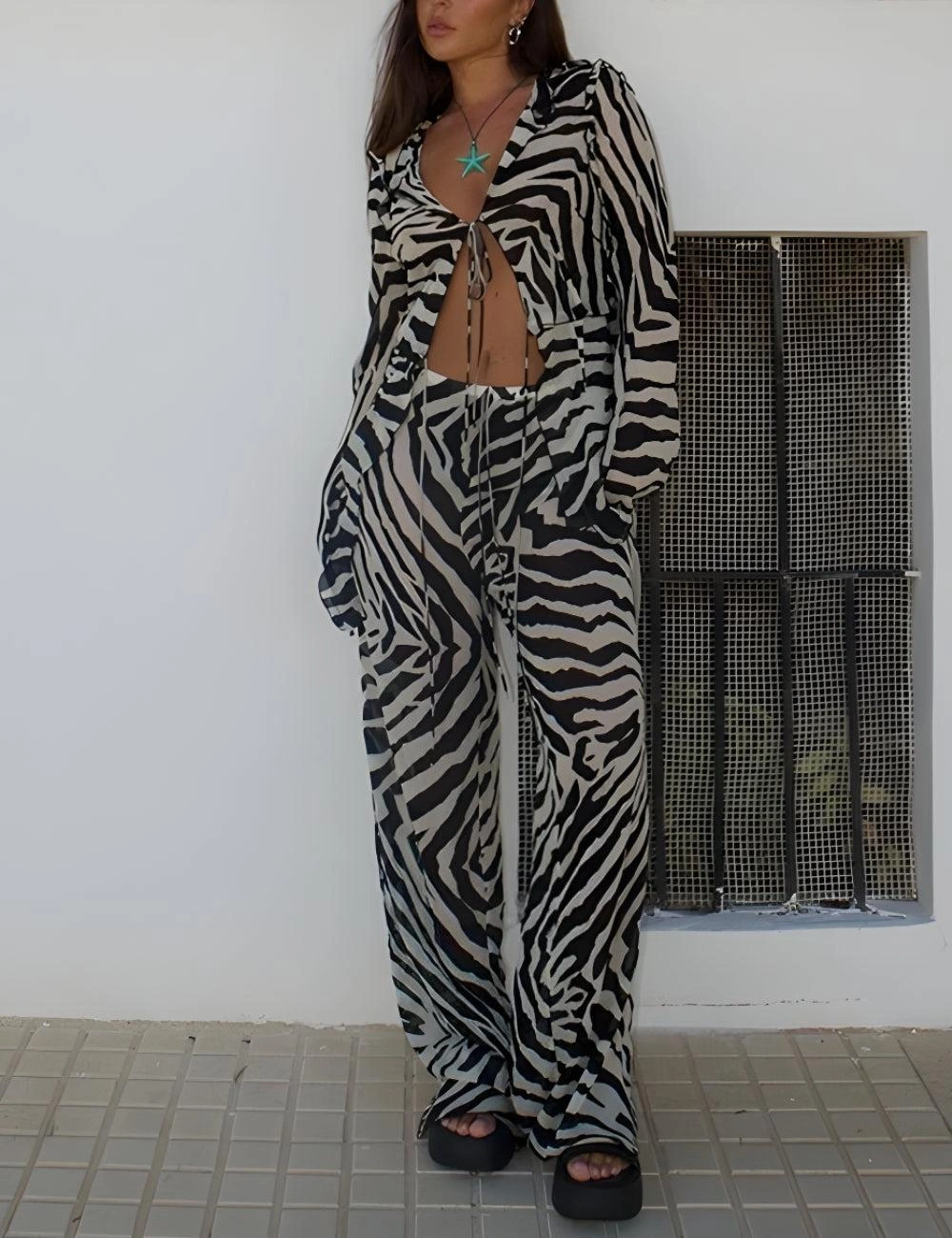 Zebra Print Set Unleashed: Tie-Up Top & Chic Pants – Instant Outfit Goals!